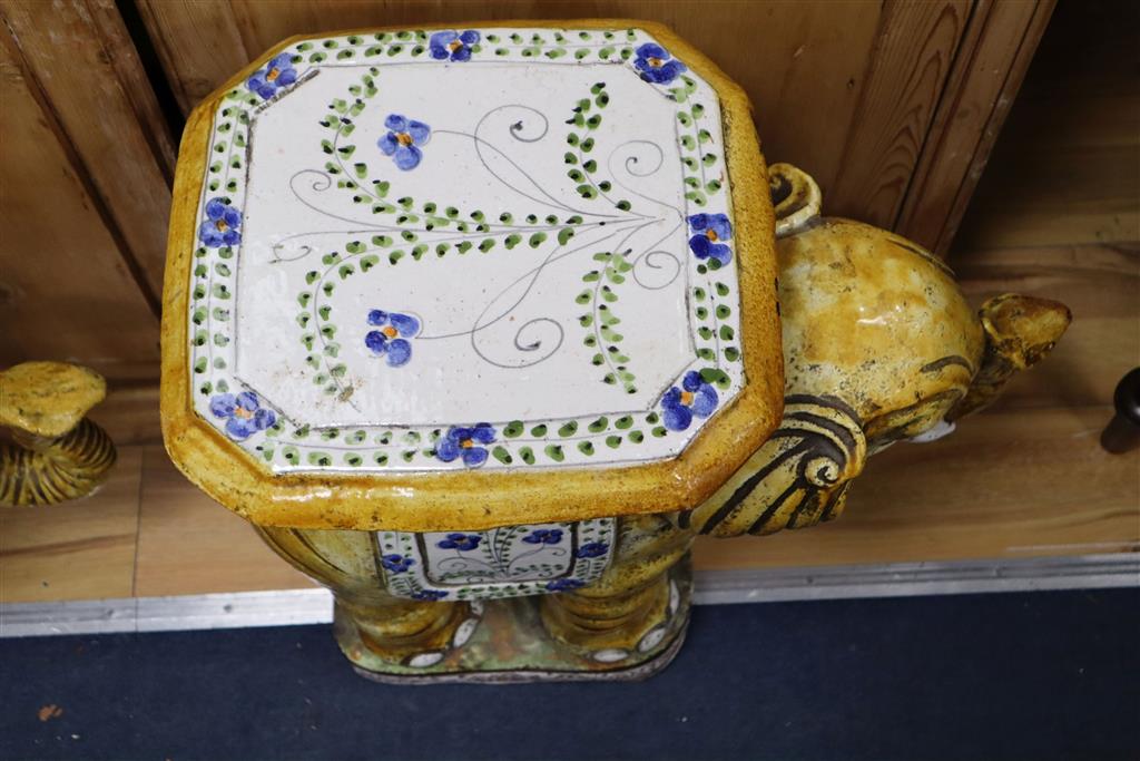 A pair of terracotta elephant garden seats